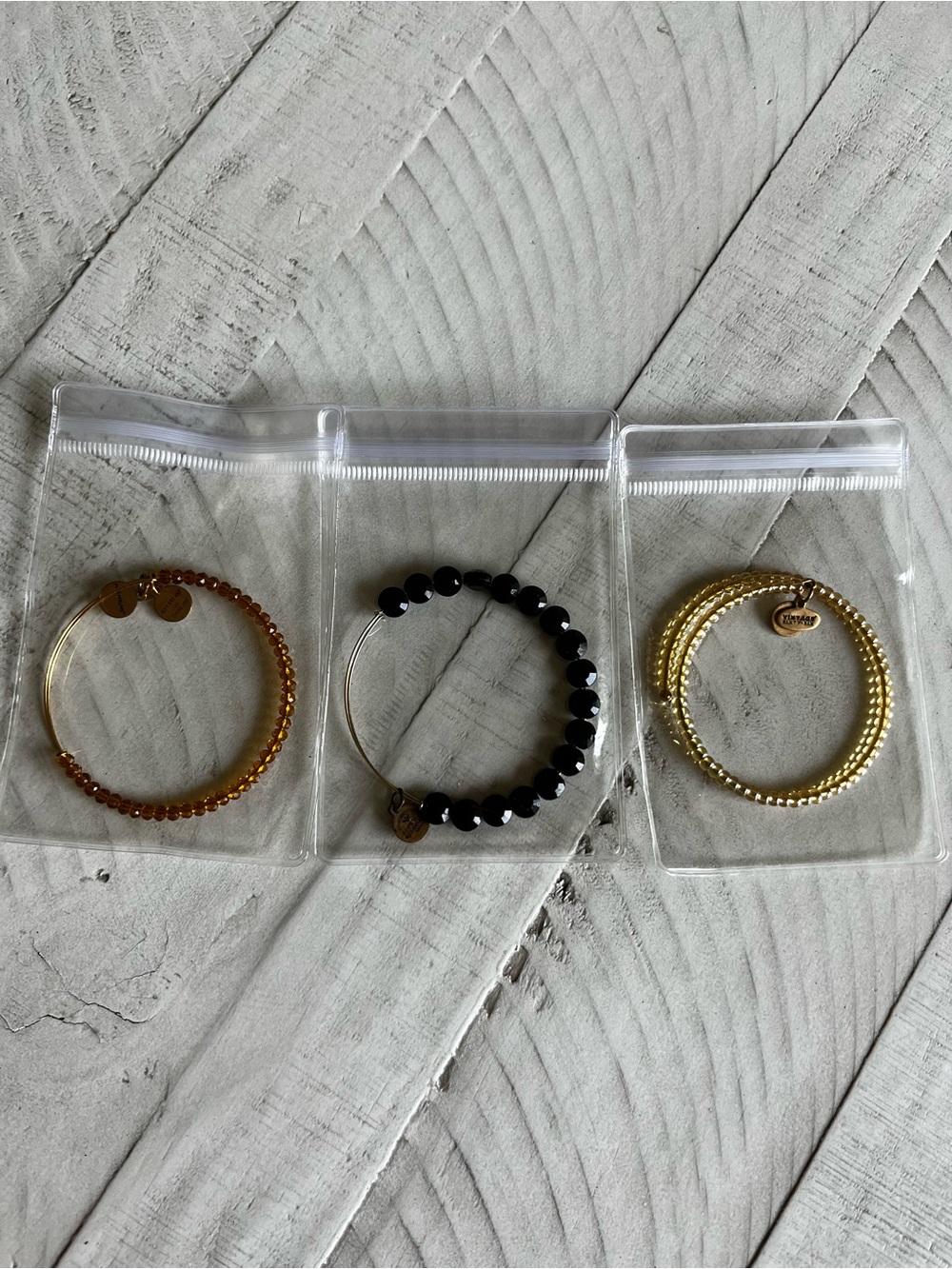 Alex and Ani Lot Of 3 Beaded Bracelet Set - Black, Amber, and Gold